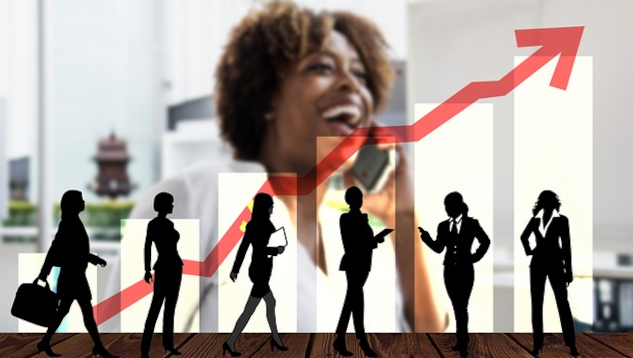 Conscious vs. Unconscious Learning: Why It Matters a female executive with a group of people in front of her